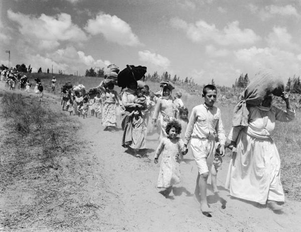 Palestinian women and children from near Haifa escape to the Arab lines in Tulkarem, 1948
