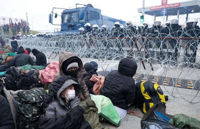 Migrants are at the border checkpoint at Bruzgi, Belarus, and Kuznica, Poland credit Oksana Manchuk