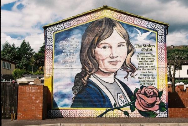 “Julie Livingstone aged 14 yrs. Murdered by the British Army 13th May 1981.” “The Stolen Child – Come away, O human child/To the waters and the wild/With a faery hand in hand/For the world’s more full of weeping/Than you can understand! – WB Yeats.” Livingstone was killed by a plastic bullet. The mural is in Glenveagh Drive.