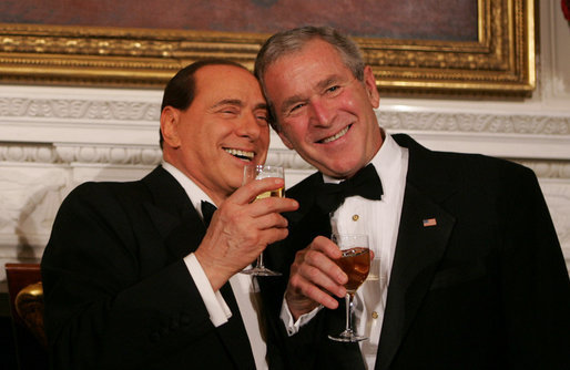 Bush and Berlusconi share toast