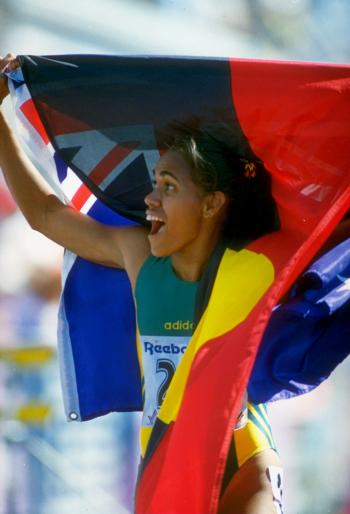 Cathy Freeman Victoria 1994 with two flags