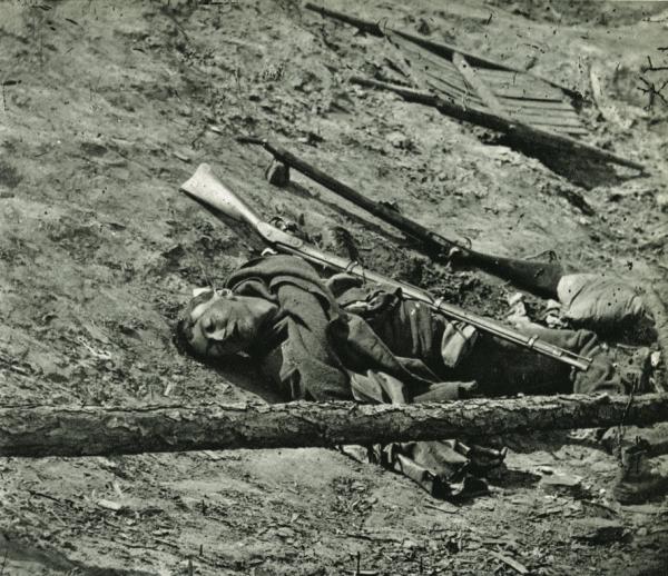 Mathew Brady, Dead ‎Confederate Soldier With Gun, Petersburg, Virginia, 1865‎