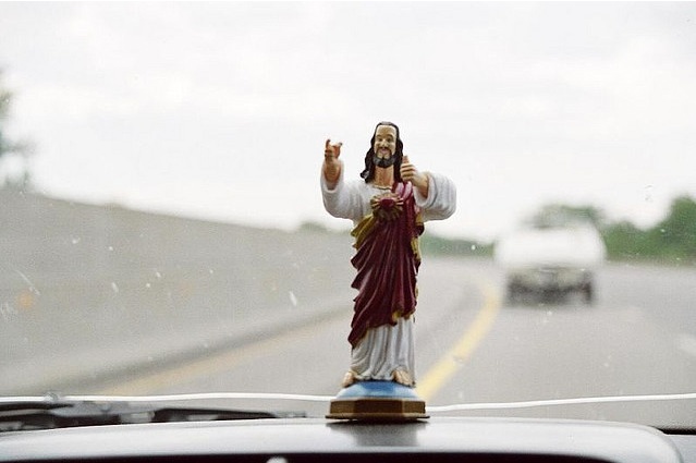 Plastic Jesus on the dashboard