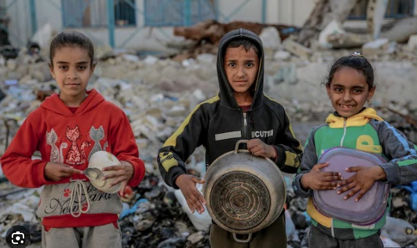 It’s tapped on basins pots and pans<br />
That starving children hold in their hand