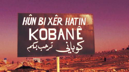 "Benvenuti a Kobanê" / "Willkommen in Kobanê".