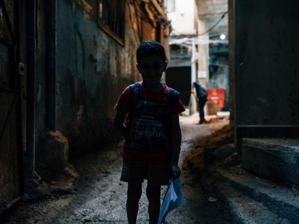  Palestinian refugee camp Bourj El Barajneh in Lebanon- Schoolboy back home  photo credit @ Paddy Dowling – The Independent  