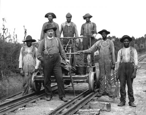 Railroad negro workers with the “Cap'n”